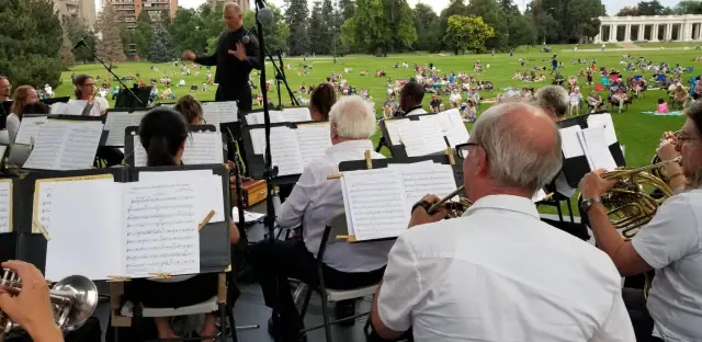 Listeners gathered at Cheesman Park to hear the band